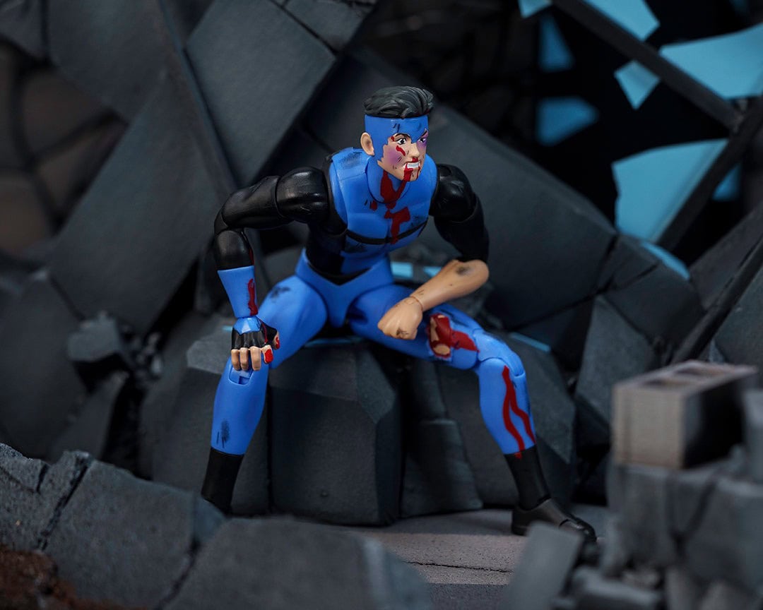 Invincible Action Fig San Diego Comic-Con exclusive Battle-Damaged Invincible action figure ...